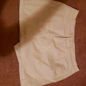 It's a all white Jean skirt, brand is ST. John's Bay, size 6p, color white